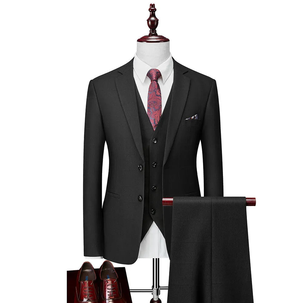 Men's navy blue plaid slim fit three-piece suit showing vest, jacket and trousers