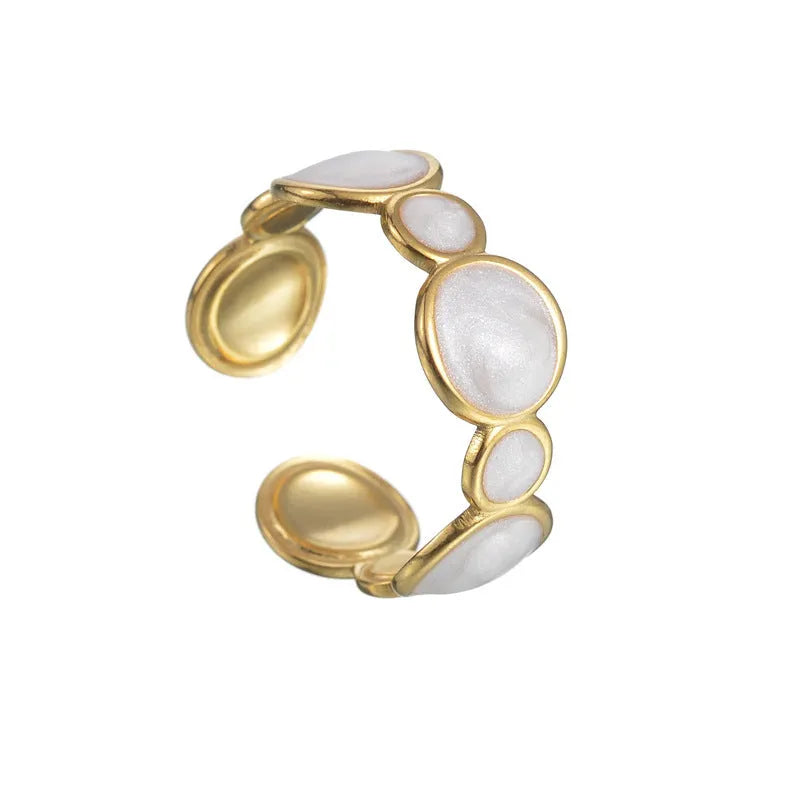 Adjustable geometric ring in stainless steel with electroplated finish, showing open design for flexible sizing