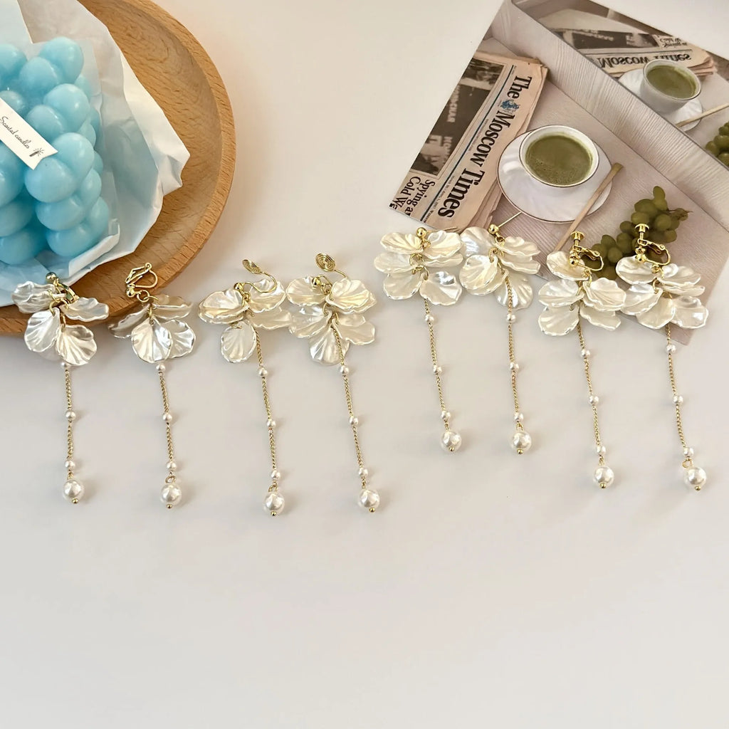 Women's fashion shell pearl tassel earrings showing 8.8cm length with multiple clip style options