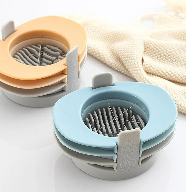 Manual egg cutter three-in-one with stackable parts, PS body, SS304 blades, available in blue, orange, red