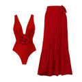 Red women's V-neck halter swimsuit with detachable matching skirt on mannequin