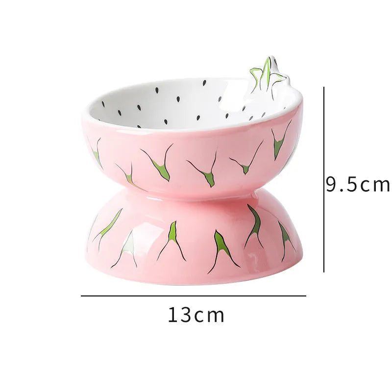 Ceramic raised cat bowl with tilted design in orange pattern, elevated 5 inches from base