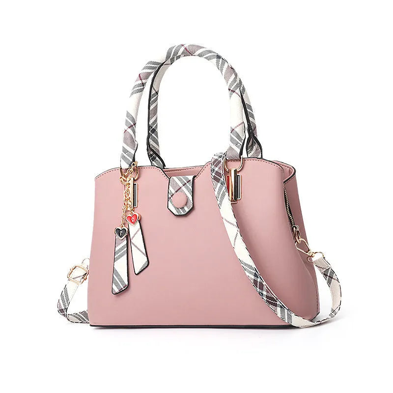 Large-capacity ladies PU Boston handbag with zipper and metal trim, medium size, available in multiple colours