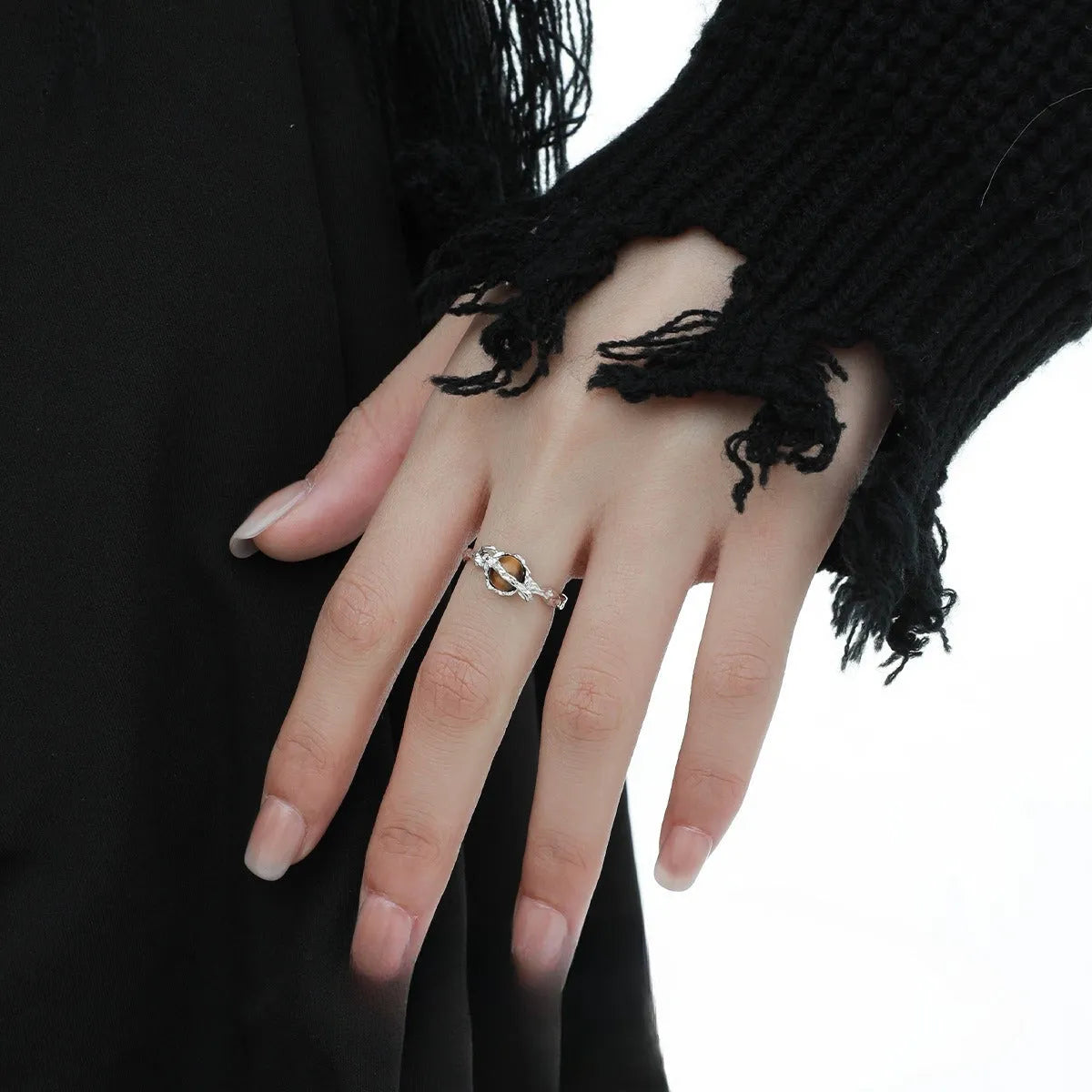 Silver Saturn planetary motif open ring with adjustable size and white gold electroplated finish
