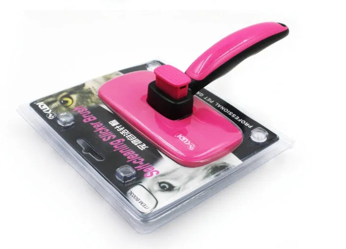 Automatic dehairing comb with stainless steel teeth and rose red handle, for dog and cat grooming, on a white background