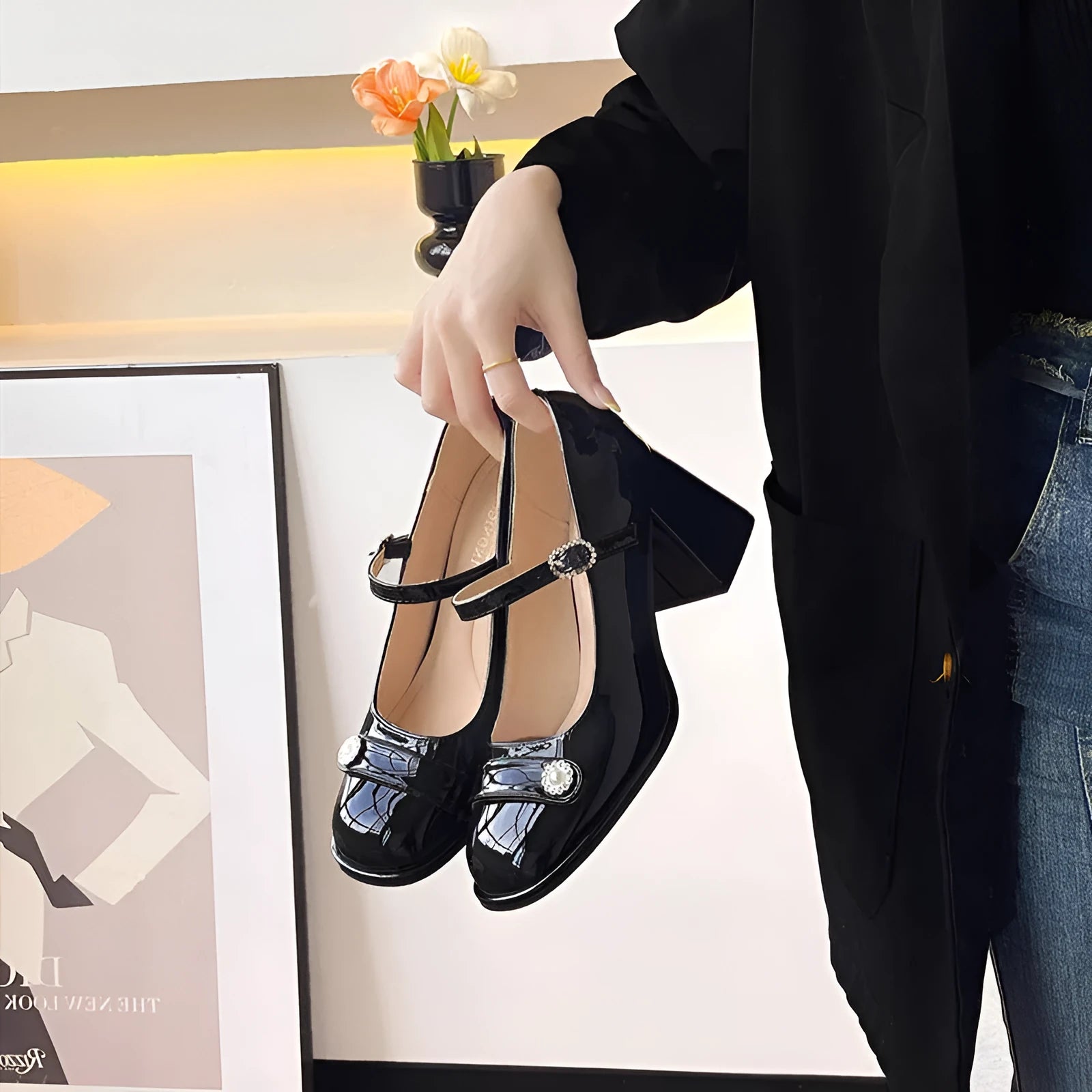 Women's apricot patent leather high heels with a round toe and chunky heel, shown with a buckle fastening.