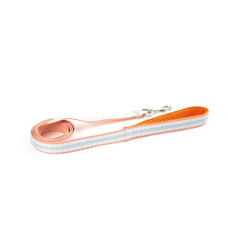 Y-style dog harness and matching 1.4 metre traction rope in coral orange for dogs 2kg to 17.5kg