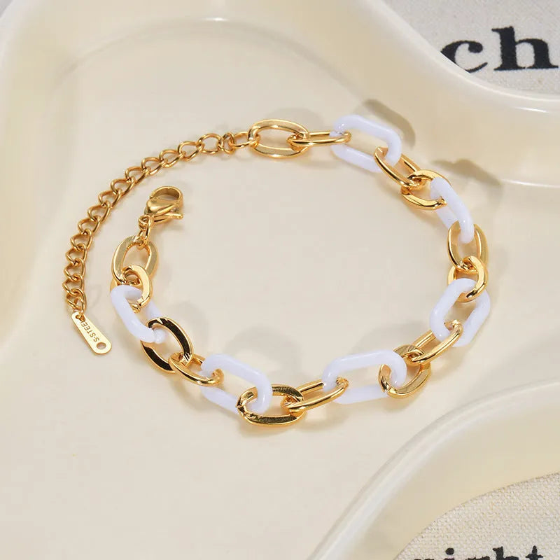 Women's stainless steel resin bracelet with double layered heart design in electroplated silver colour
