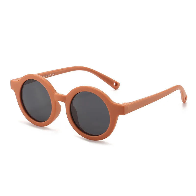 Children's round sunglasses for 0-3 year olds with UV400 protection, shown in a selection of colours.