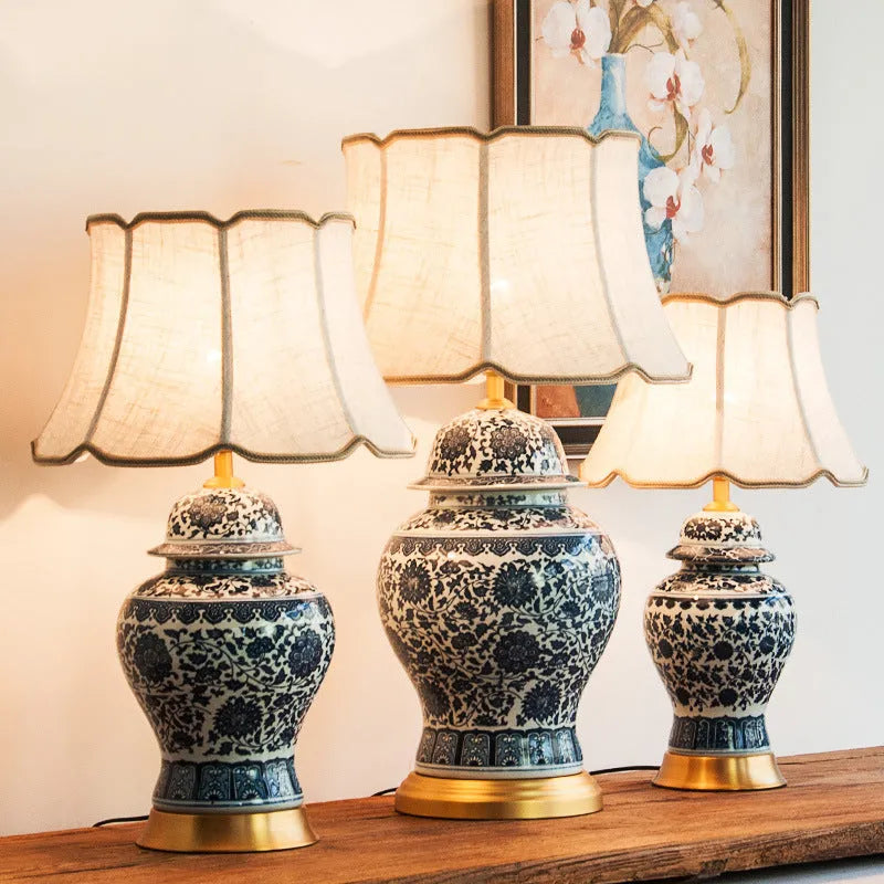 Blue and white porcelain Chinese table lamp with handmade ceramic body and cloth shade
