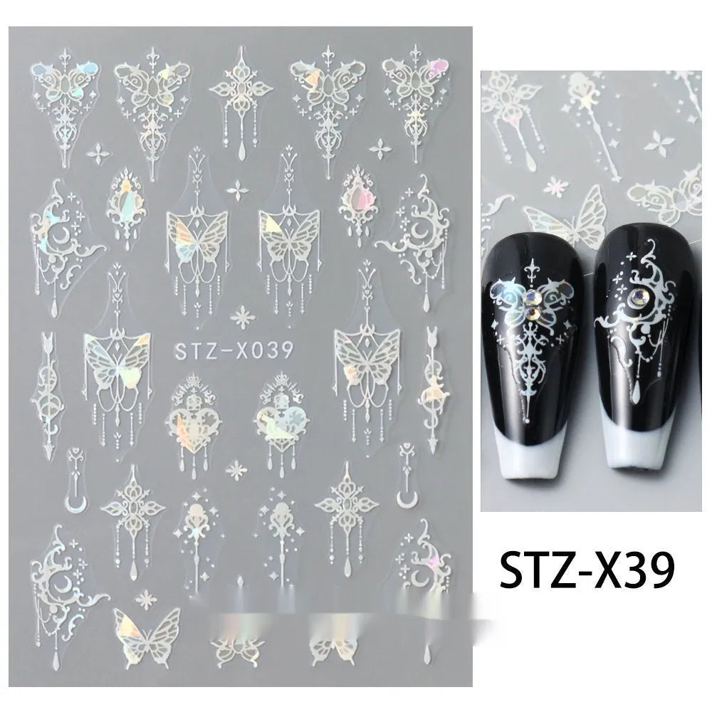 Sheet of black and silver strip nail art stickers with cartoon and love heart designs