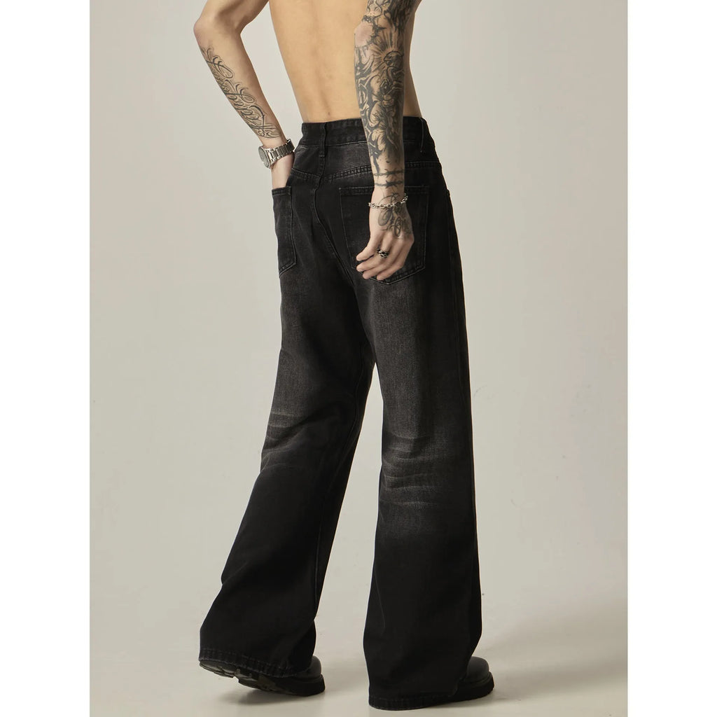 Black loose straight leg men's jeans with retro styling and zipper fly