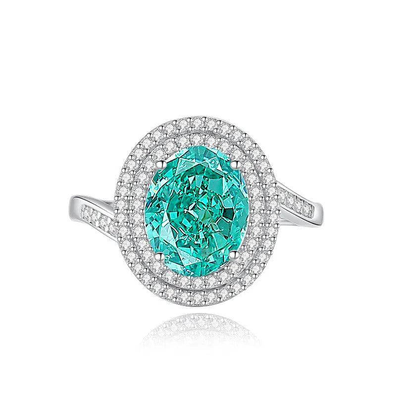 S925 sterling silver ring for women with a green emerald stone set using Palaibahao inlay and diamond accents.