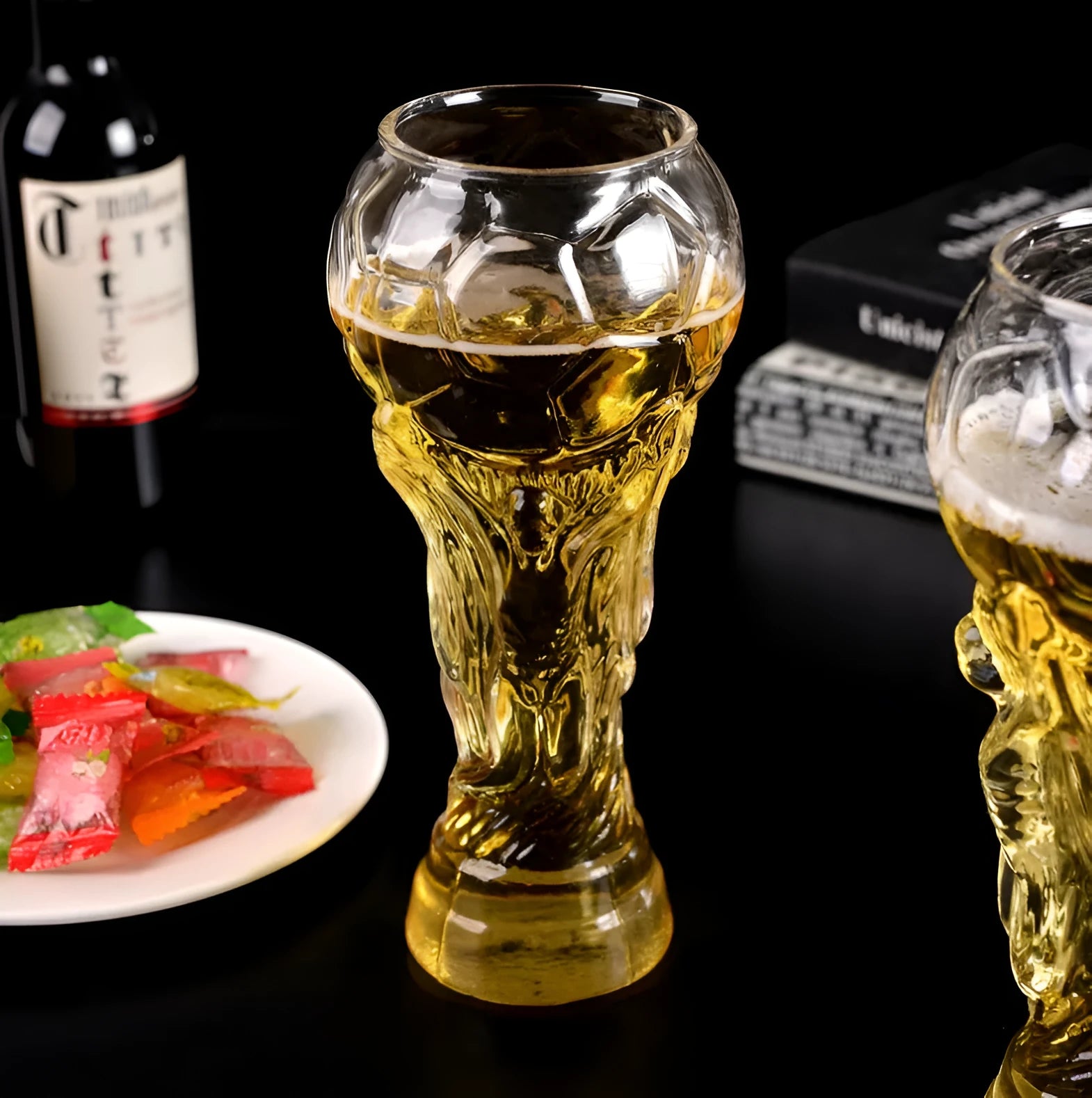 Hercules transparent glass beer cup shaped like a world cup trophy with 450ml capacity and 19cm height