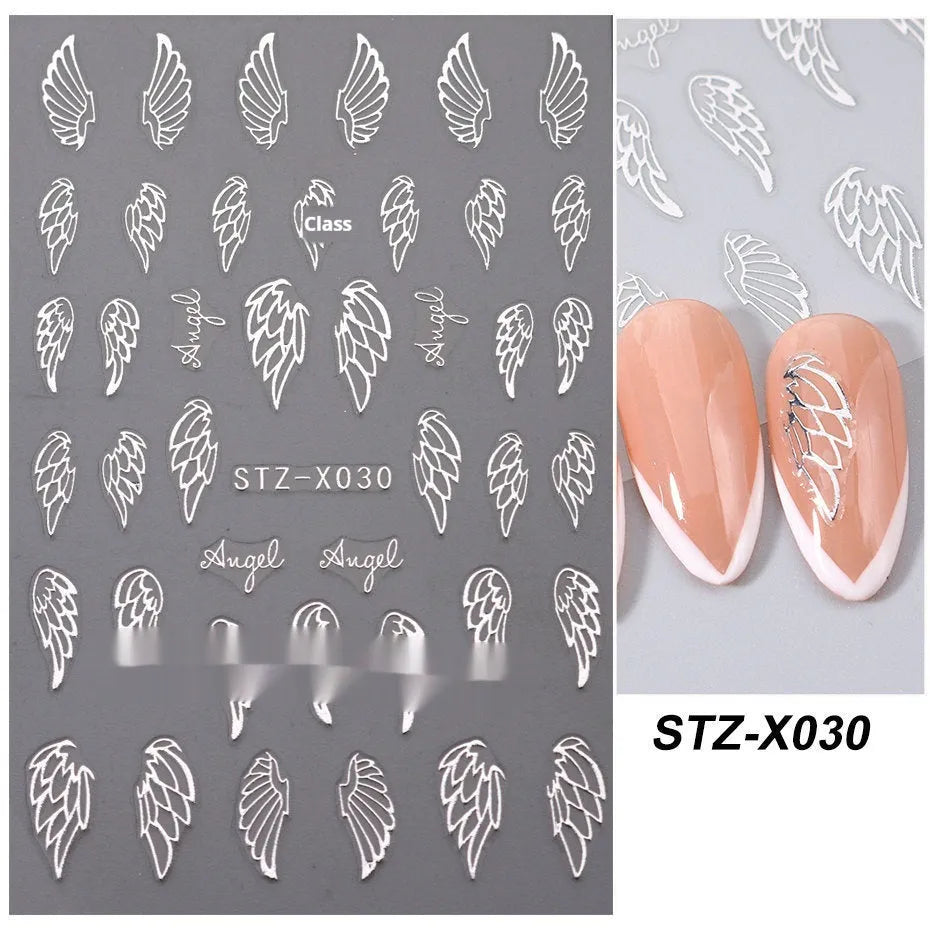 Sheet of black and silver strip nail art stickers with cartoon and love heart designs