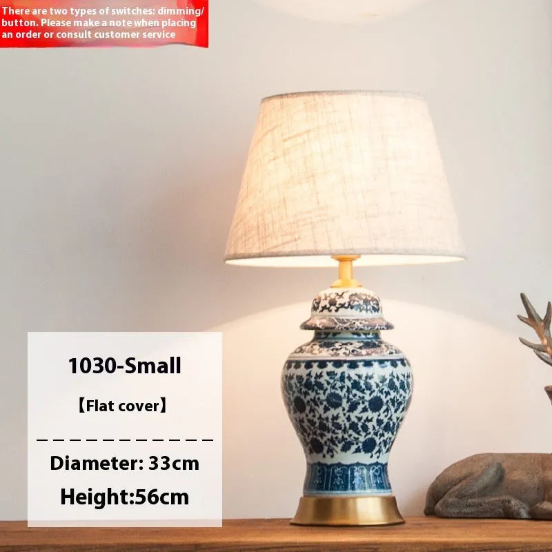 Blue and white porcelain Chinese table lamp with handmade ceramic body and cloth shade