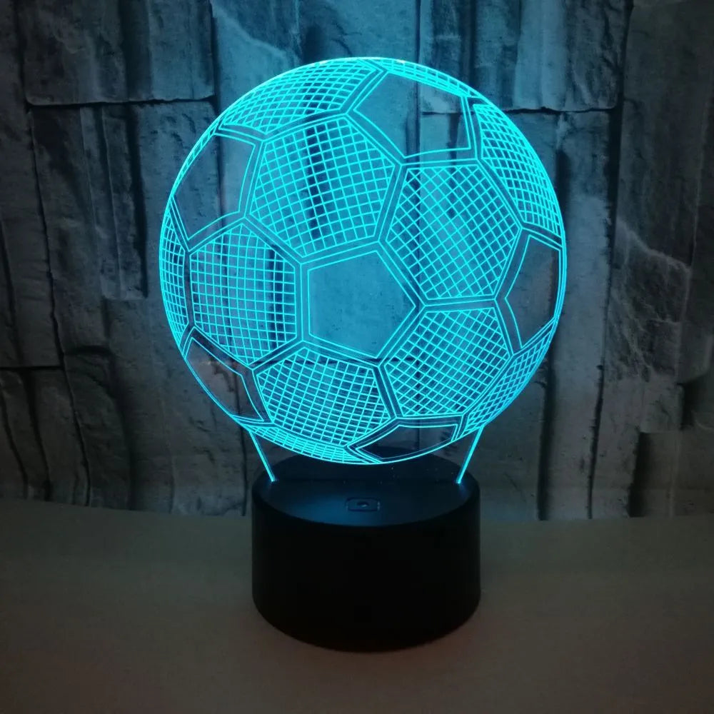 3D acrylic football night light displaying blue colour on a square black ABS base with USB cable.