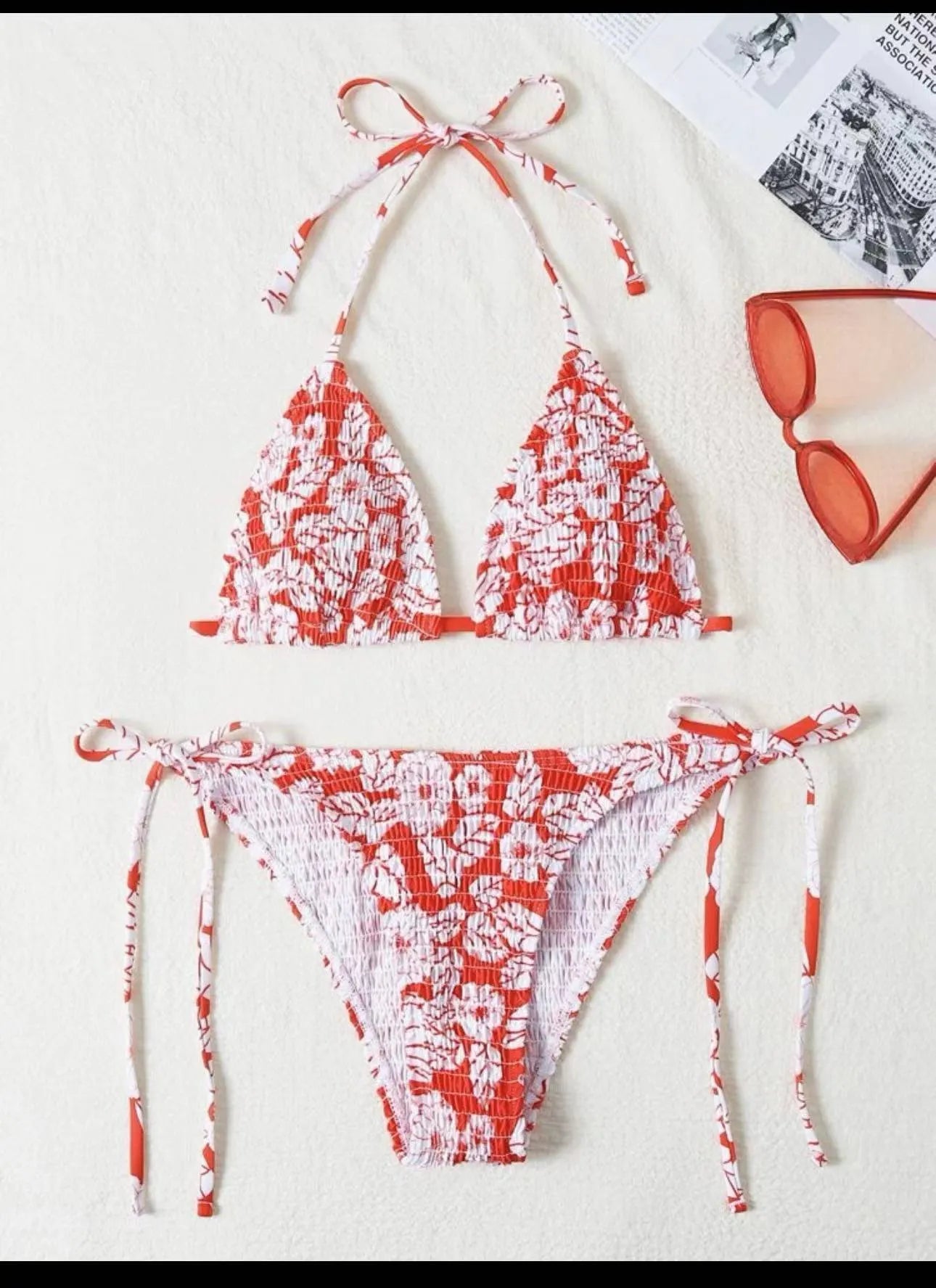 Women's floral patterned halter-neck bikini set in multiple colours on a mannequin