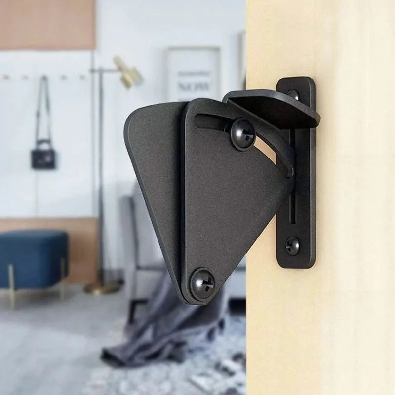 Black stainless steel sliding barn door lock for interior doors.