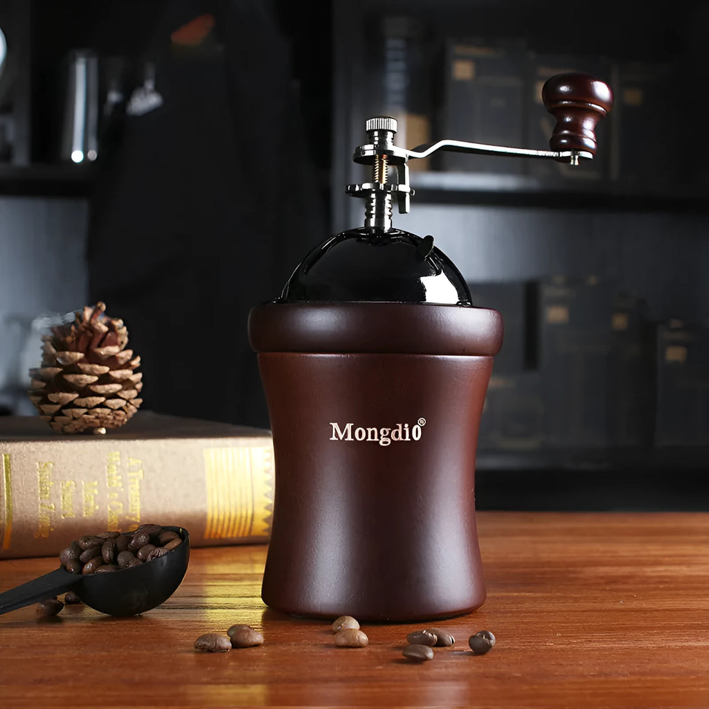 Solid wood barrel manual coffee grinder with hand crank in natural coffee colour