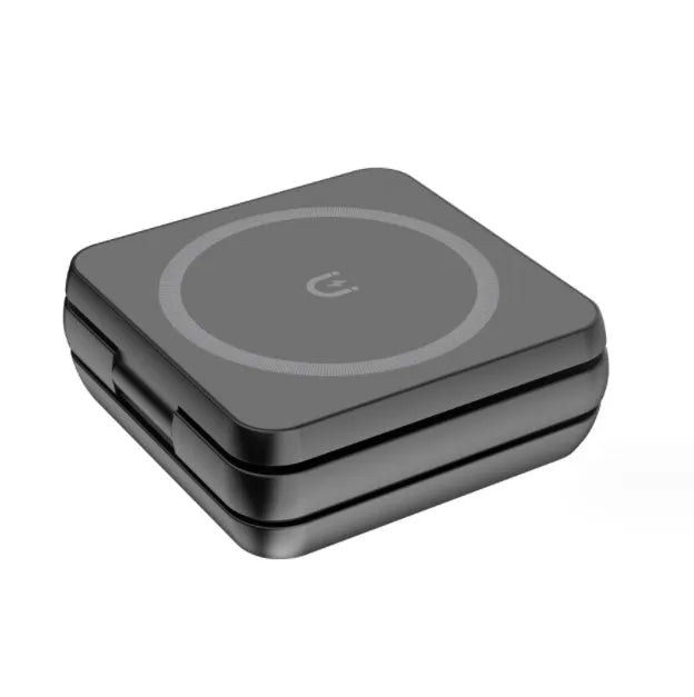 Folding three-in-one desktop wireless charging bracket for Apple, Samsung, and Google Pixel devices on a table.