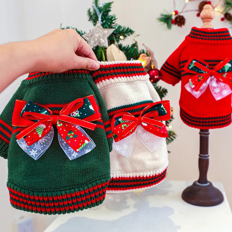 Red polyester Christmas dog jumper on small dog showing festive patterns and pullover design