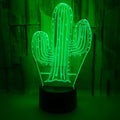 Cactus 3D night light with touch control showing green LED glow on a wooden table