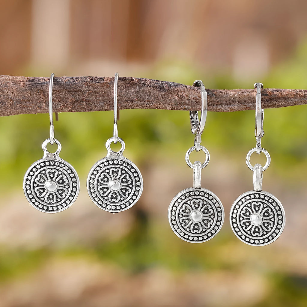 Geometric round women's earrings with distressed ethnic print in retro bohemian style.