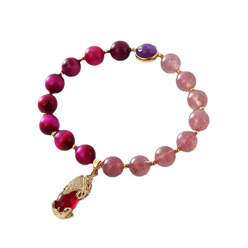 Women's strawberry crystal bracelet on elastic rope measuring 18cm with simple jewellery design