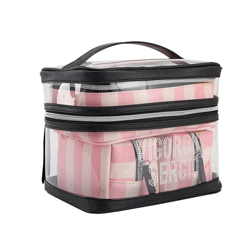 Pink striped waterproof makeup bag with flower pattern and synthetic leather construction