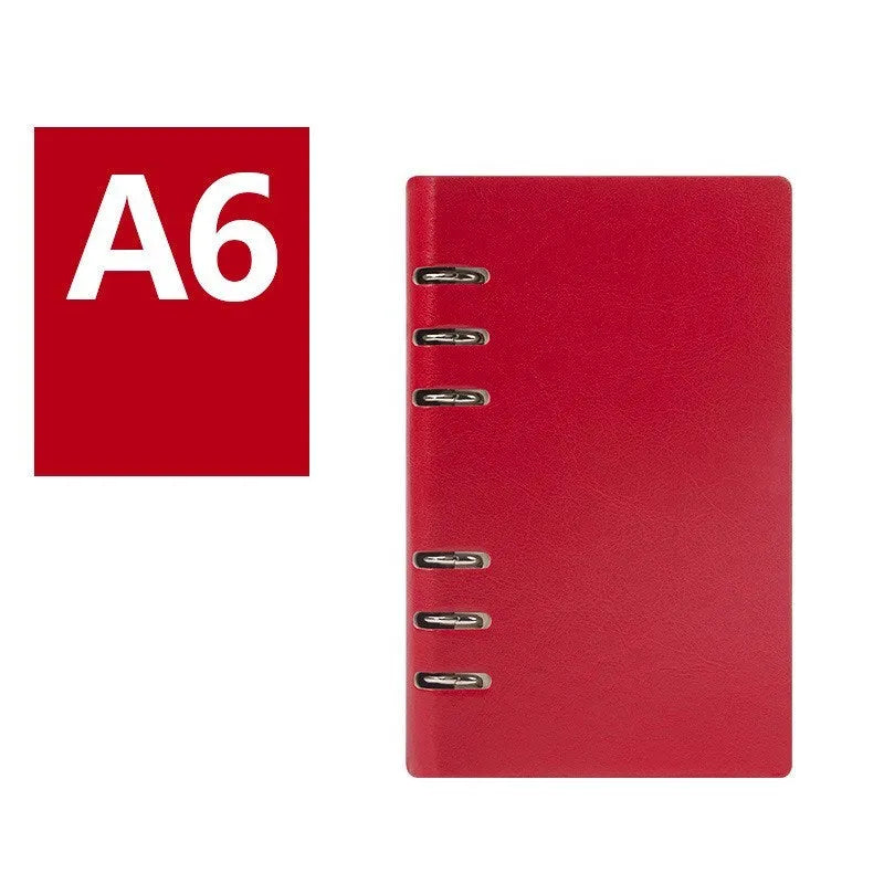 Simple business notebook with imitation leather cover showing loose-leaf binding and beige road forest paper