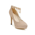 Women's solid colour platform stiletto heels with a pointed toe in blue, pink, gold, or silver.