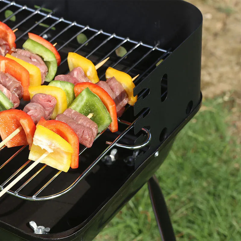 Portable metal barbecue oven in black, dimensions 29x12x44cm, suitable for camping and outdoor use