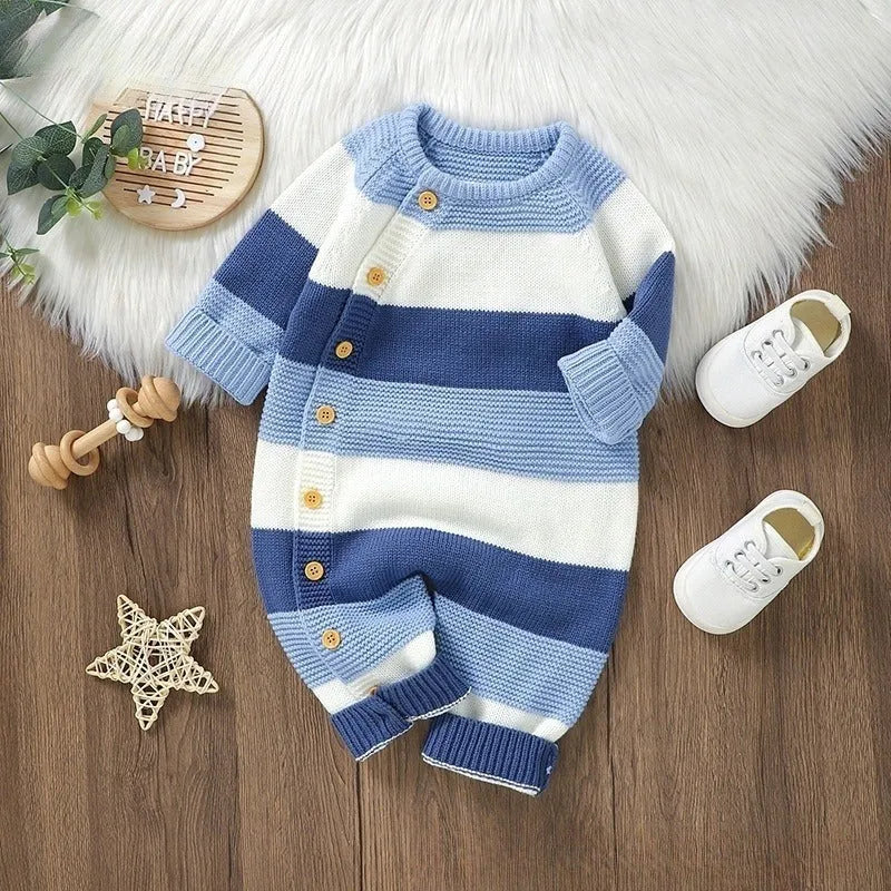 Knitted one-piece baby romper jumpsuit in white with single-breasted front closure and long sleeves