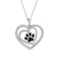 Copper dog paw print necklace with heart motif on cross chain for women