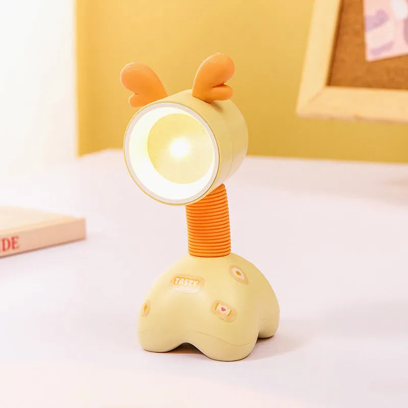 Cartoon animal magnetic night lamp with adjustable head on metallic surface