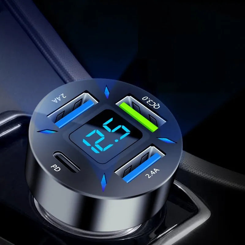 Black four-port USB car charger with LED digital display showing charging status