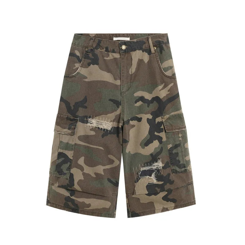 Men's camouflage cropped jeans with distressed patch detailing and straight-leg styling