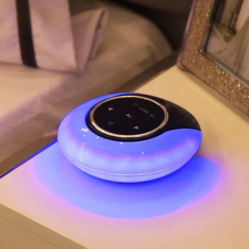 Blue cubic Bluetooth desk lamp with speaker and touch controls for dimming and colour selection