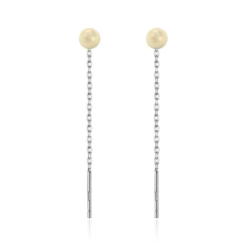 Long sterling silver needle ear string with a choice of geometric or pearl pendants for women.