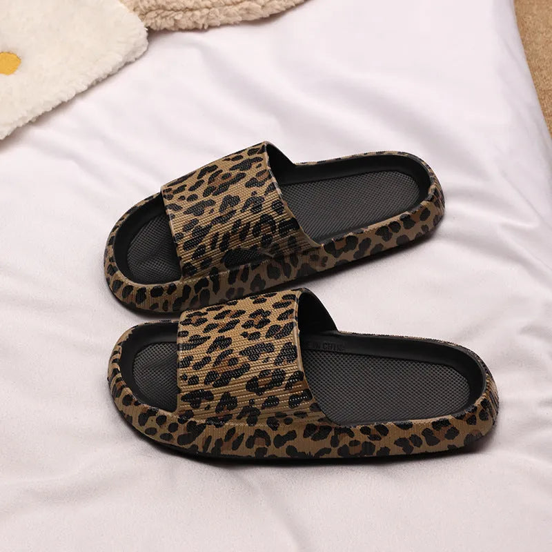 Women's leopard print EVA slippers with thick sole on a white background.
