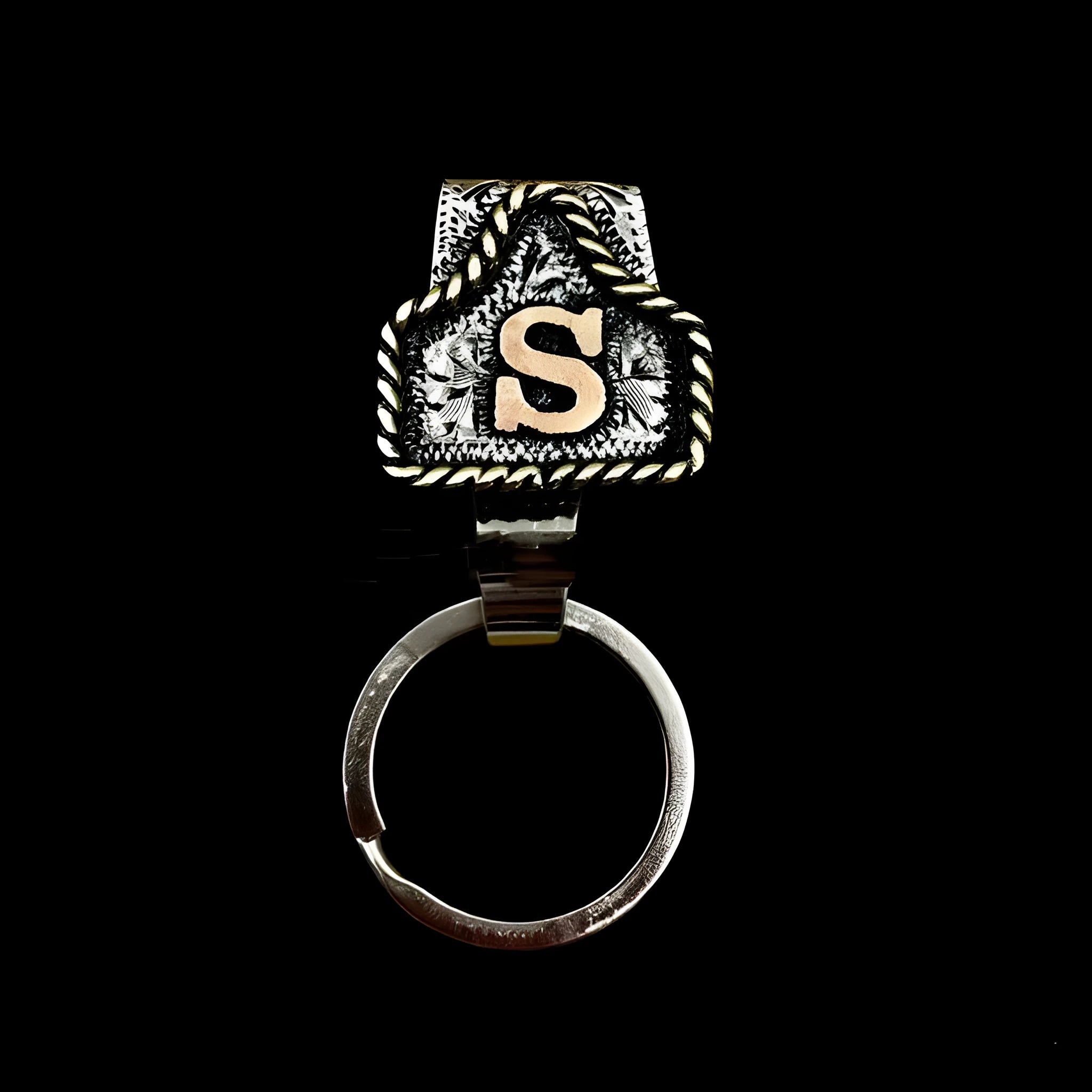 Handmade metal keychain with a cow tag charm in one of 26 available colour options.