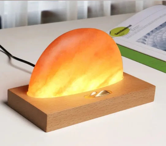 Sunrise Oriental LED table lamp with natural crystal salt shade and wireless charging on beech wood base
