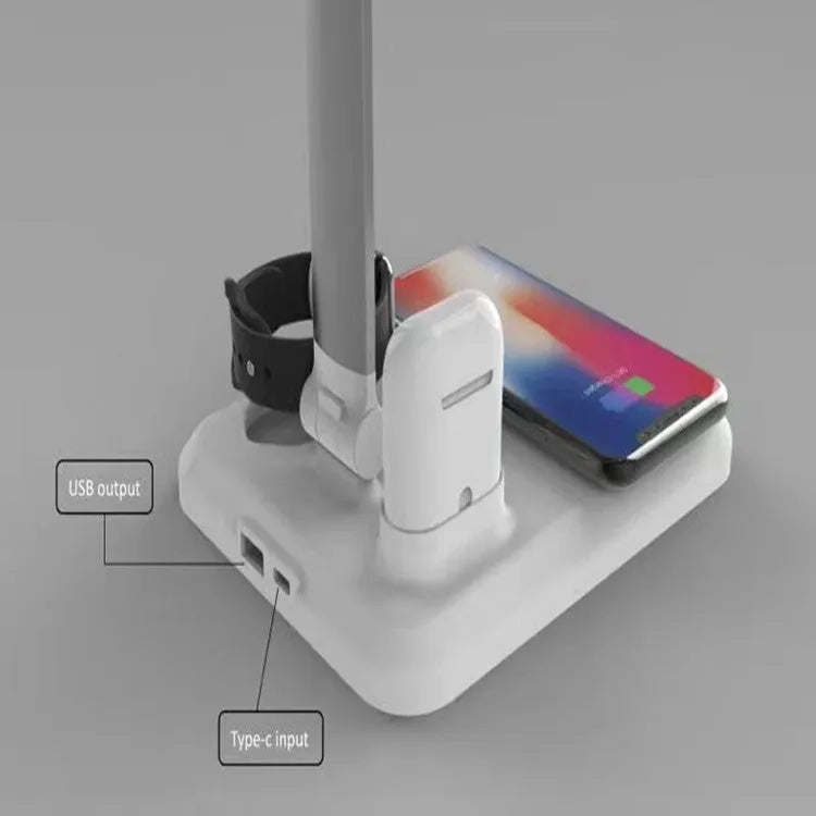 X-1 4-in-1 multi-function LED desk lamp in black or white with wireless charging pad.