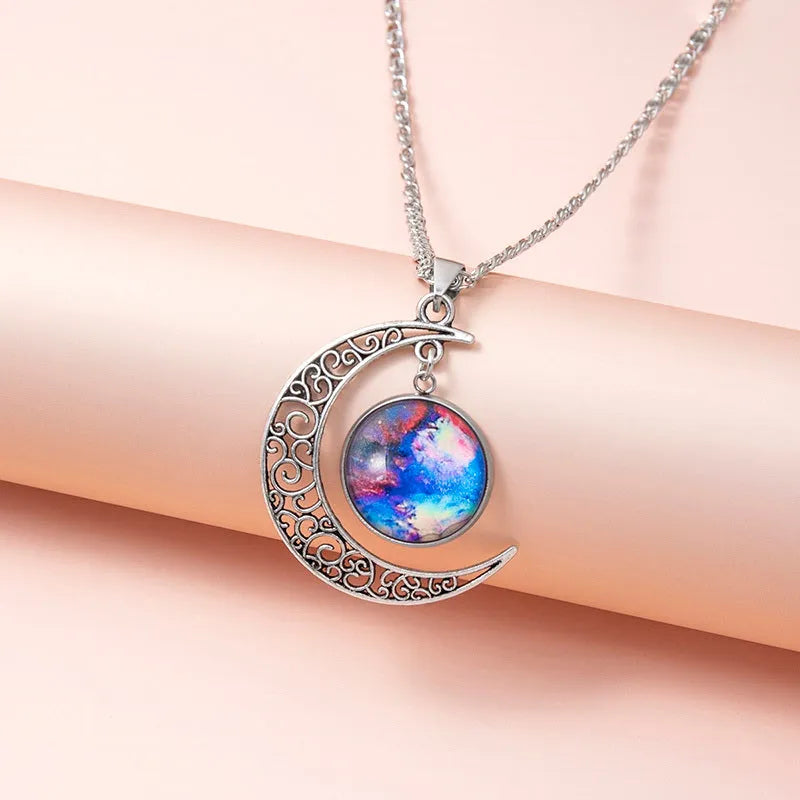 Silver hollow moon pendant necklace with glass star insert on Figaro chain for women