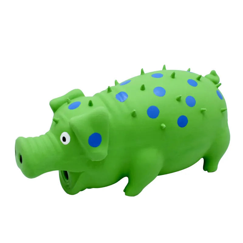 Pig-shaped latex squeaky dog chew toy in various colours with textured surface