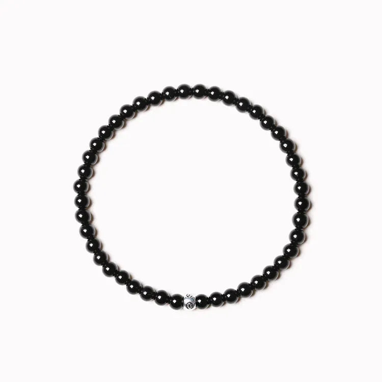 Geometric agate bracelet with 4mm beads in black, blue, and obsidian colours