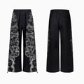 Streetwear set showing trousers, hoodie, and shorts in printed polyester fabric with loose fit design