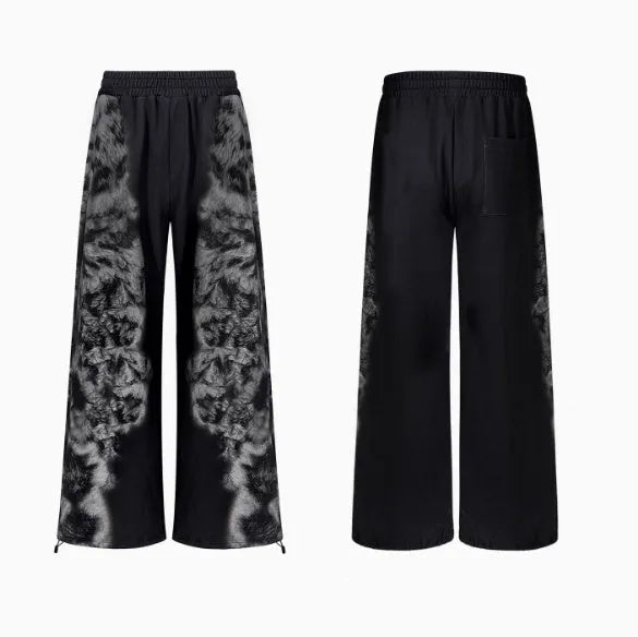 Streetwear set showing trousers, hoodie, and shorts in printed polyester fabric with loose fit design