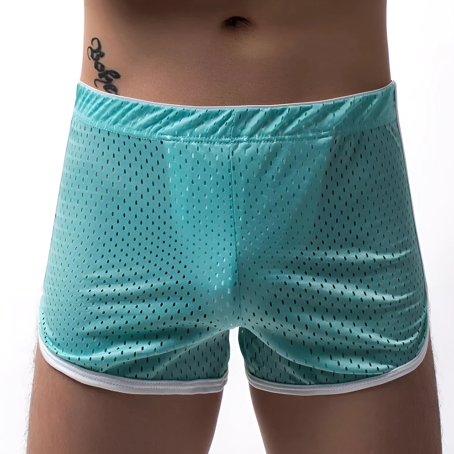Men's solid colour boxer shorts in a cotton and nylon fabric blend, shown in black, on a mid-waist fit model.